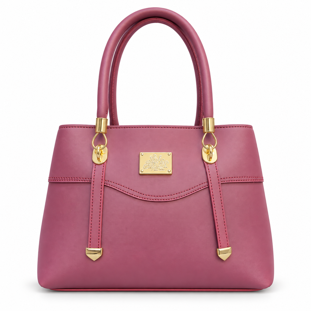 A structured magenta leather handbag with gold-tone hardware, featuring dual top handles, a front strap detail, and a gold brand plaque on a white background.