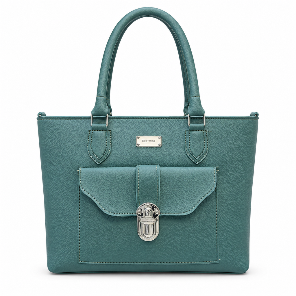 A teal green pebbled leather tote bag with silver-tone hardware, featuring dual top handles, a front flap pocket with a decorative clasp, and a small 'SILKY WEAR' brand plaque on the front.