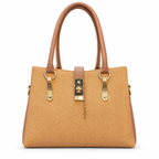A structured tan herringbone-patterned handbag with brown leather handles and trim, featuring gold-tone hardware and a decorative hanging charm, shown against a plain white background.