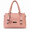 Structured handbag with three zip compartments, top handles and tassel charm